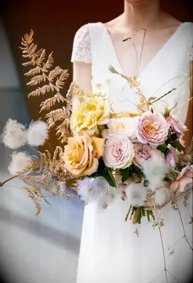 fall wedding bouquet with pink and yellow roses 