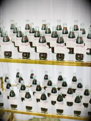 Delightful miniature coke bottle wedding favors.