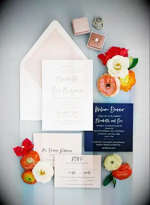 A beautiful autumn-inspired stationery suite in pale taupe and vibrant navy.