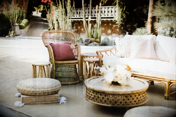 A cozy selection of wicker outdoor furniture in autumnal colors.