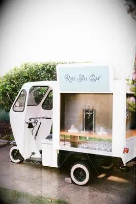 vintage truck converted into bar with wine on tap