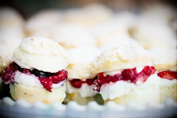 Cream puffs filled with fresh fruit. 