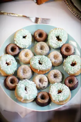 Plate of elegant mini donuts. 