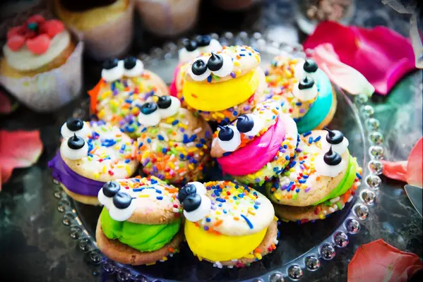 Mini ice cream sandwhiches in a variety of colors. 