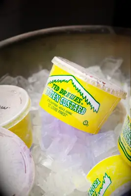 Individual portions of frozen custard on ice. 