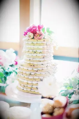 Chocolate chip cookie cake topped with fresh flowers. 