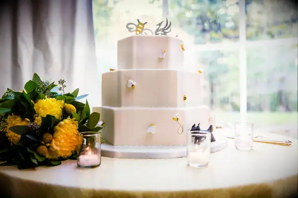 Three-tiered Hexagonal Wedding Cake with Honeycomb Design