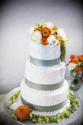 Three-Tier White, Orange and Green Cake
