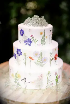 Three-tier wedding Cake With Fresh Flowers