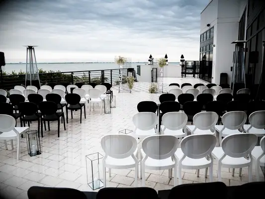 Black and white ceremony seating at wedding