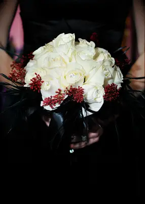Black and white bouquet with red accents