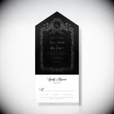 Garden-inspired black and white wedding invitation
