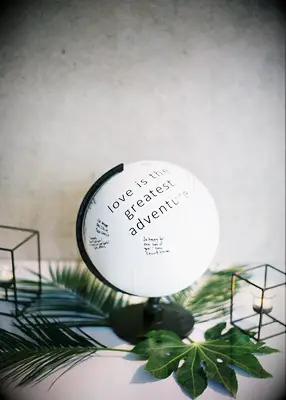 Black-and-white globe guest book at wedding