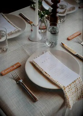 Terracotta slab wedding place card idea
