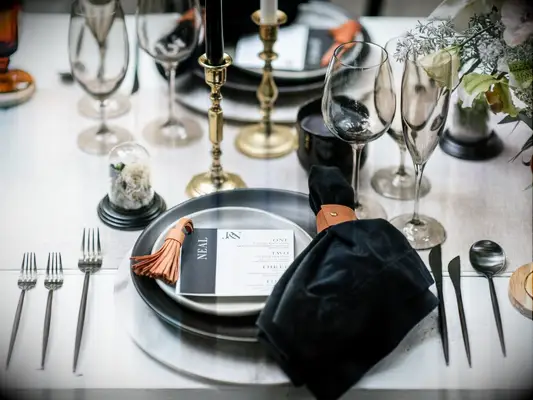 black-and-tan wedding place setting