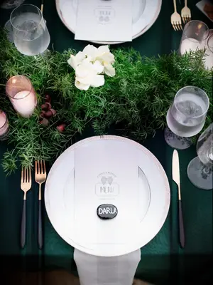 simple place setting with greenery garland