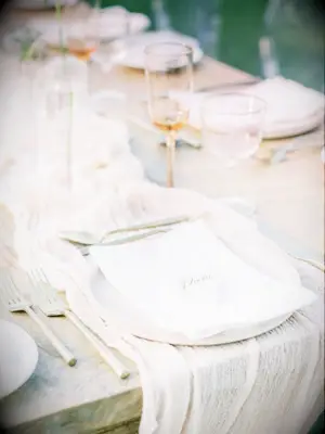 Beige place setting with linen table runner