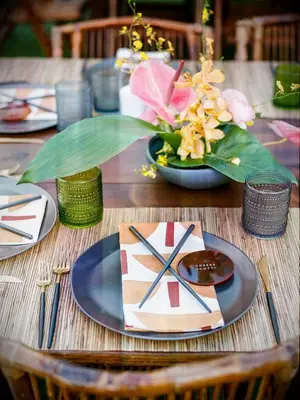 tropical place setting with patterned napkin