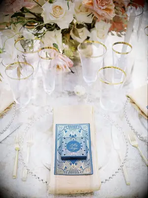 art deco black-and-gold wedding place setting