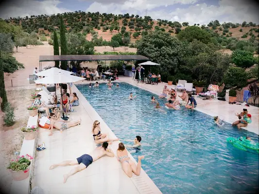 Pool party at summer wedding in Spain