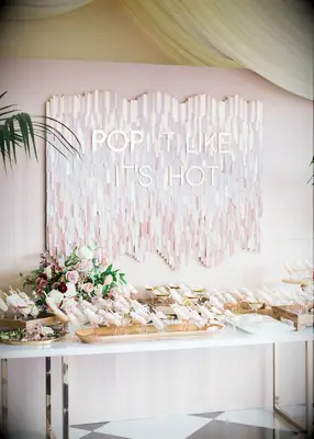 Gold and blush popsicle sign at summer wedding