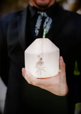 Custom coconuts at summer wedding