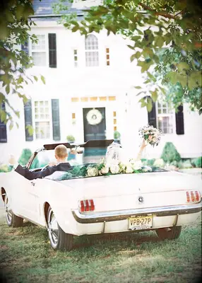 Convertible getaway car at summer wedding