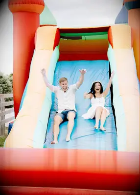 Inflatable slide at summer wedding 