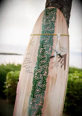 Surfboard guest book at summer wedding