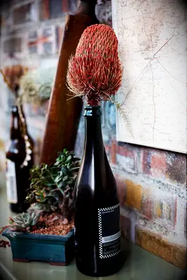 Wine bottles budget wedding centerpiece