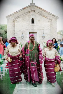 Parents of the bride at ceremony in Nigerian wedding attire