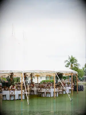 outdoor wedding reception with white sailcloth tent