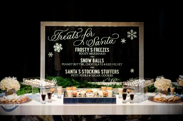 Christmas-themed dessert table at a wedding.