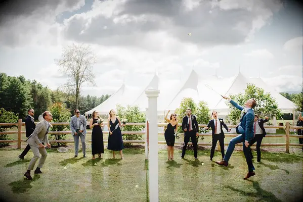 Wedding guests playing badminton