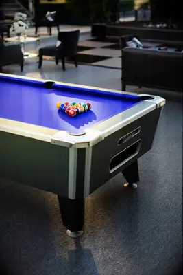 Purple pool table at wedding reception
