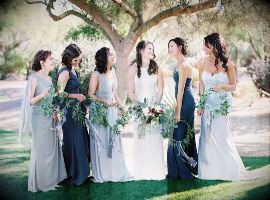 Group of bridesmaids holding unique bouquets