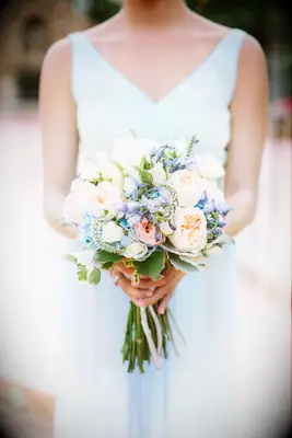 bridesmaid bouquet with blush juliet garden roses, blue delphinium and greenery