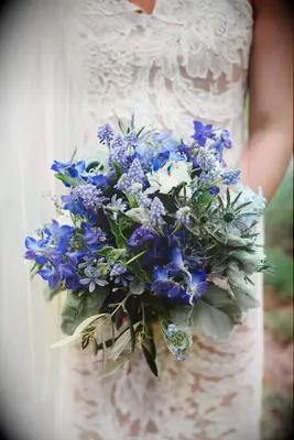dark blue wedding bouquet with muscari, delphinium, forget me nots and thistle