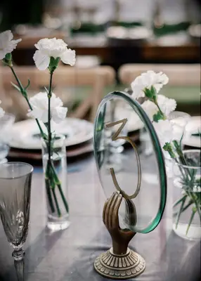 Carnations in small vases wedding centerpiece