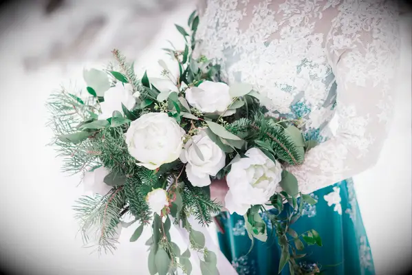 White rose and eucalyptus winter wedding bouquet