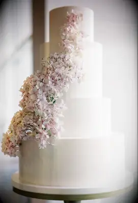 White Wedding Cake With Cascading Hydrangeas