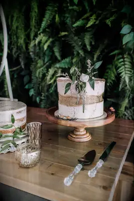 White and Gold Cake with Greenery