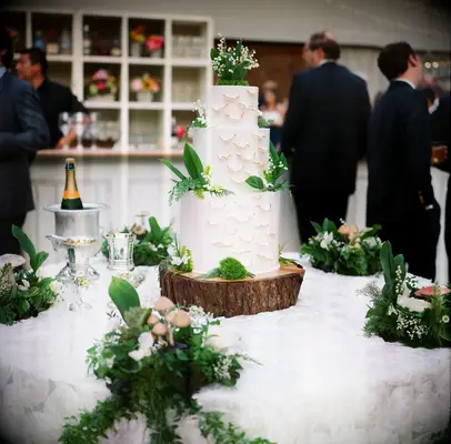 Log- and Mushroom-Inspired White Wedding Cake