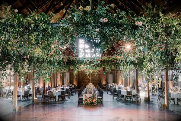 Barn Wedding Reception With Greenery