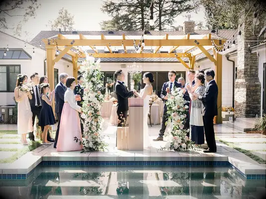 Poolside Backyard Wedding Ceremony Idea