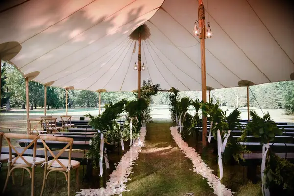 Flower Petals Lined This Tent Wedding Ceremony