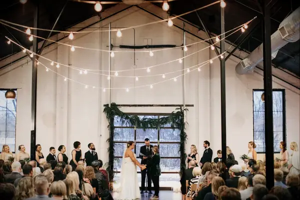 White Barn Decorated for a Winter Wedding Ceremony