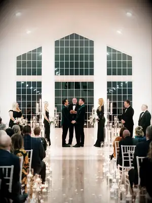 White Candlelit Winter Wedding Ceremony