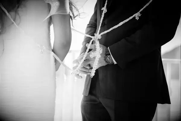 Couple partaking in lasso ceremony