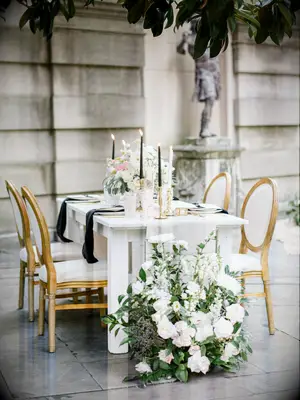 glam microwedding tablescape with gauze white table runner and white louis xvi chairs